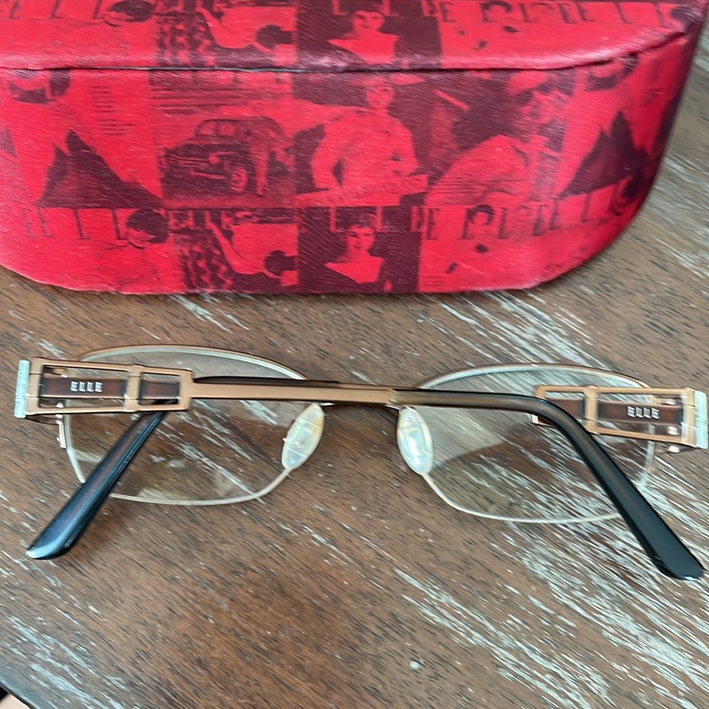 Elle El18779 Brown And Bronze Wire Half Rim Eyeglasses With Red Design Elle Case View 3